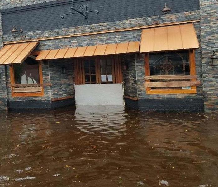 Storm waters at restaurants front door